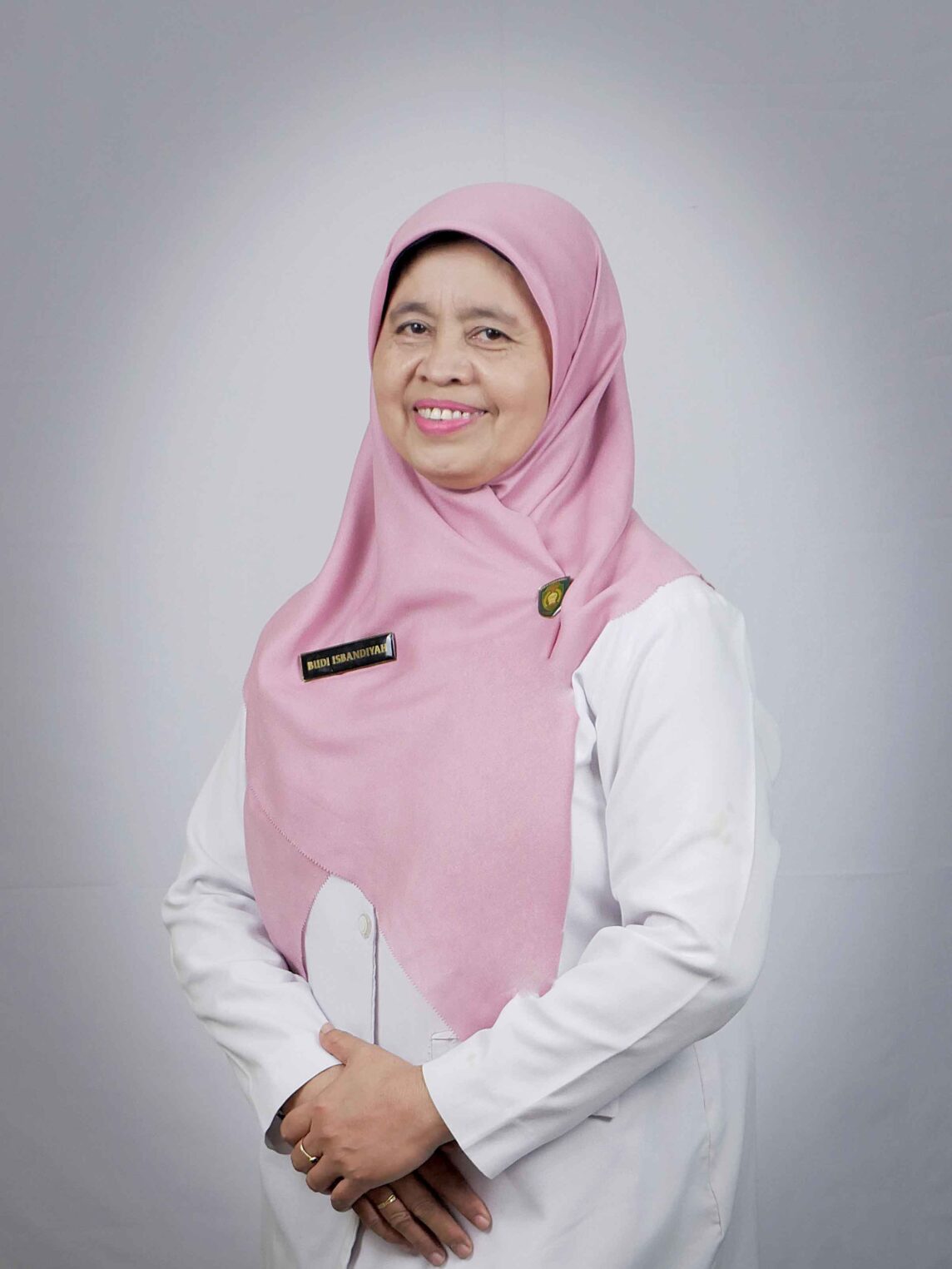 Dra. Budi Isbandiyah